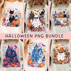 May include: A collection of six cream-colored t-shirts featuring Halloween-themed graphic prints. Designs include a black cat with a pink bow, a ghost wearing sunglasses and blowing a bubble, a haunted house, and a ghost wearing a cowboy hat and boots.