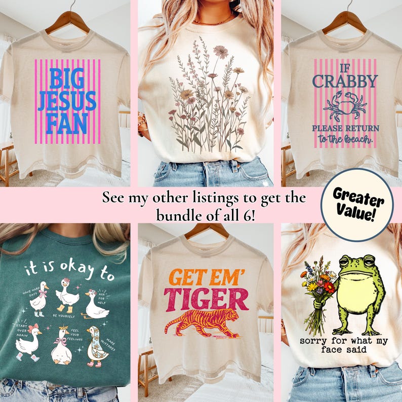 K&ouml;nnte beinhalten: Kollektion von sechs Grafik-T-Shirts. Designs beinhalten "BIG JESUS FAN" mit rosa Streifen, Blumendruck, "IF CRABBY PLEASE RETURN to the beach", "it is okay to" mit Enten, "GET EM' TIGER" mit einem Tiger und einen Frosch mit Blumen.