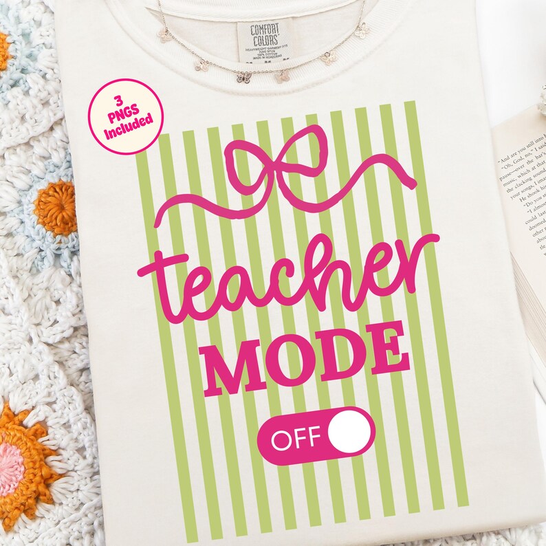 May include: Cream-colored t-shirt with a pink bow and the words "teacher MODE OFF" in pink. The design includes green vertical stripes. A small pink circle indicates "3 PNGs Included". A delicate necklace is visible.