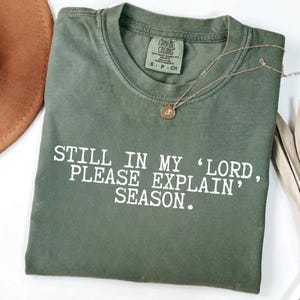 Still In My Lord, Please Explain Season Tee, Funny Christian Shirt,  Faith Over Fear, Christian T-Shirt, Funny Jesus Shirt, Faith Humor
