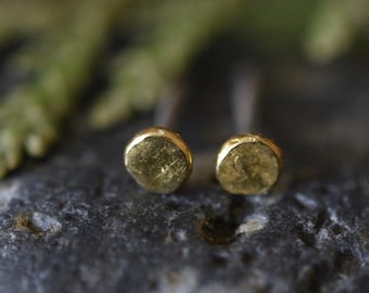 Tiny solid 22k gold stud earrings with sterling silver posts