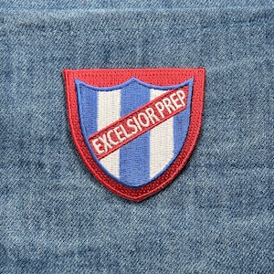 May include: A set of three ceramic mugs with a speckled, matte finish. The mugs are in shades of cream, light gray, and dark gray. Each mug has a simple, minimalist design, perfect for coffee or tea.