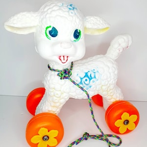 THIRD instalment PLUS POSTAGE blow mold plastic White Lamb pull toy Orange yellow Daisy wheels Big eyes