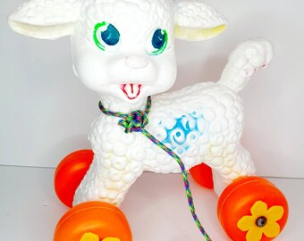 Reserved for Zoha Super kitsch vintage blow mold plastic White Lamb pull toy Orange yellow Daisy wheels Big eyes nursery decor  Pull Cord