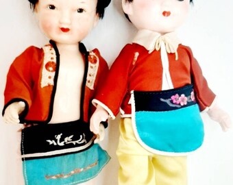 Vintage Chinese doll pair  National Costume silk outfit jacket apron shoes girl sisters Tourist Souvenir Kitsch folk lot of 2 dolls