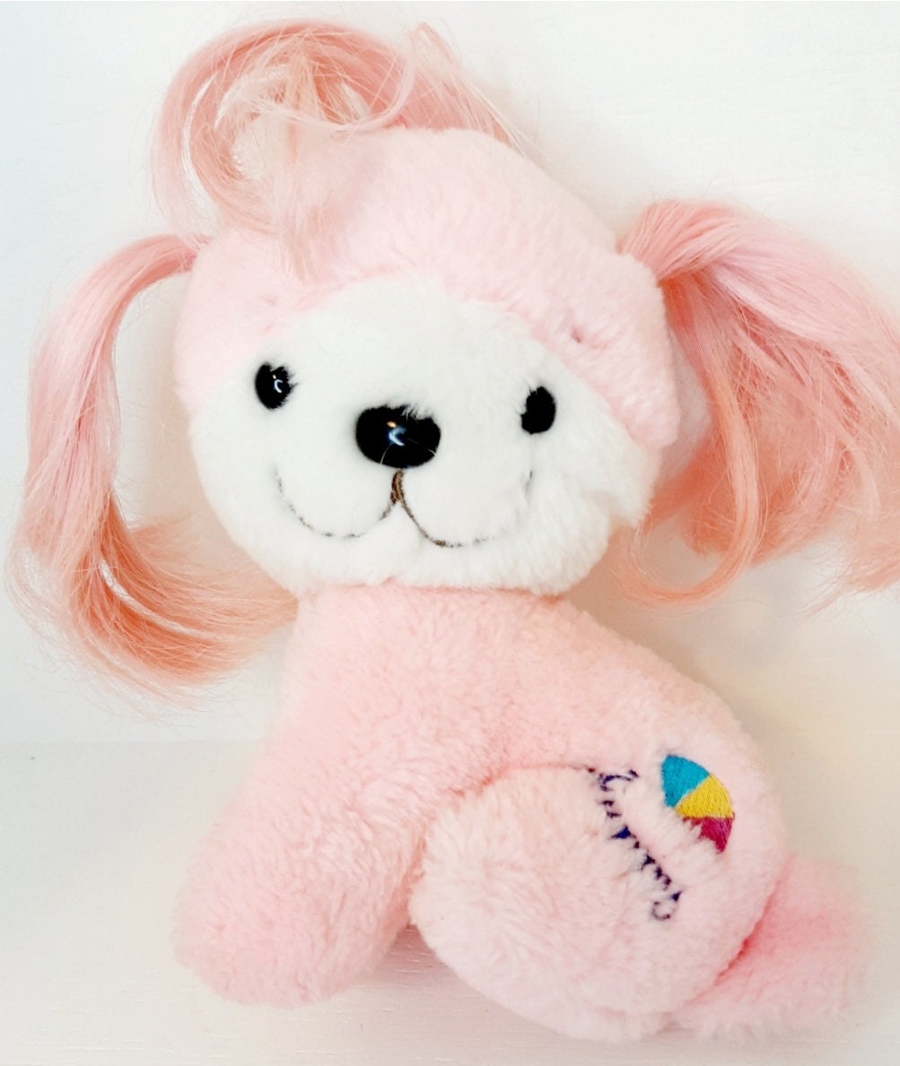 Perro store poochie juguete