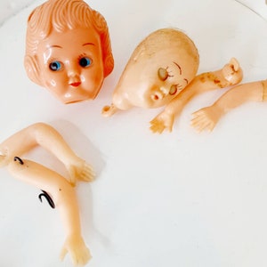 Vintage Doll head Lot craft supply restoration sleep eyes Evergreen lot of 2 Heads 4 arms doll replacement parts