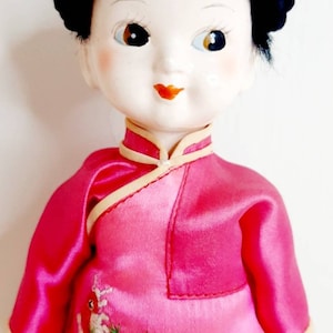 Vintage Chinese doll traditional costume girl black hair braids Pink Blue silk outfit red shoes tourist kitsch souvenir