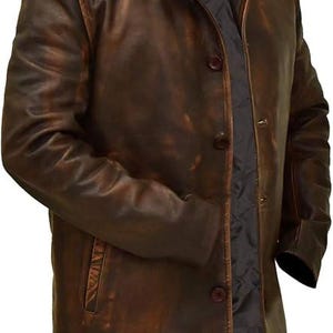 May include: Brown leather jacket with a classic design. The jacket features a button-down front, a notched collar, and a quilted lining. The leather has a distressed finish, giving it a vintage look.
