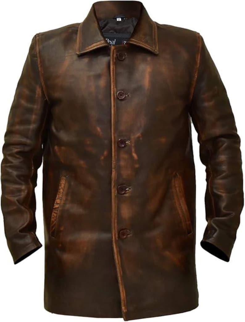 May include: A brown leather jacket with a button-up front, a collared neckline, and two front pockets. The jacket has a distressed, vintage look with variations in the brown color.