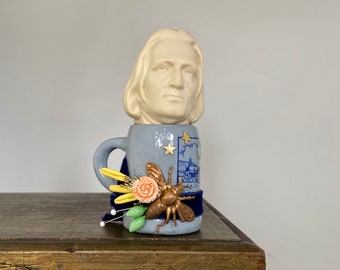 composer franz liszt in a beer stein. vintage finds folk assemblage art. one of a kind and original hanging ornament.