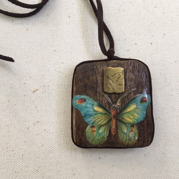 assemblage art pendant necklace. found object art jewelry. one of a kind and original. butterfly.