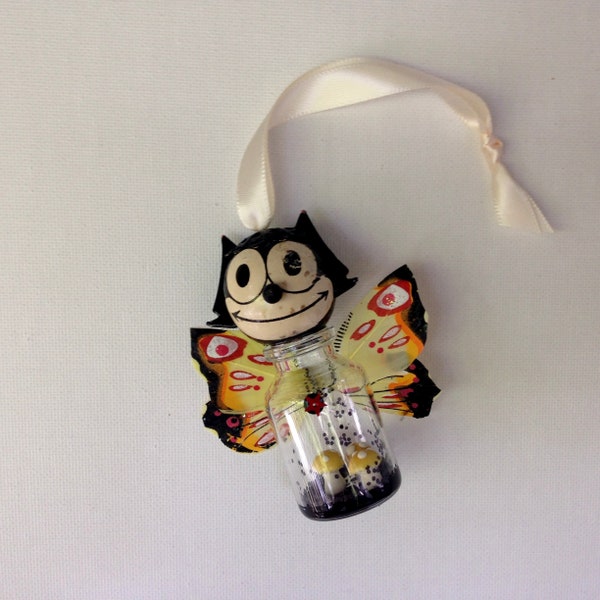 felix the cat ornament.   assemblage art.  mushrooms and butterfly wings.  one of a kind original hanging art.