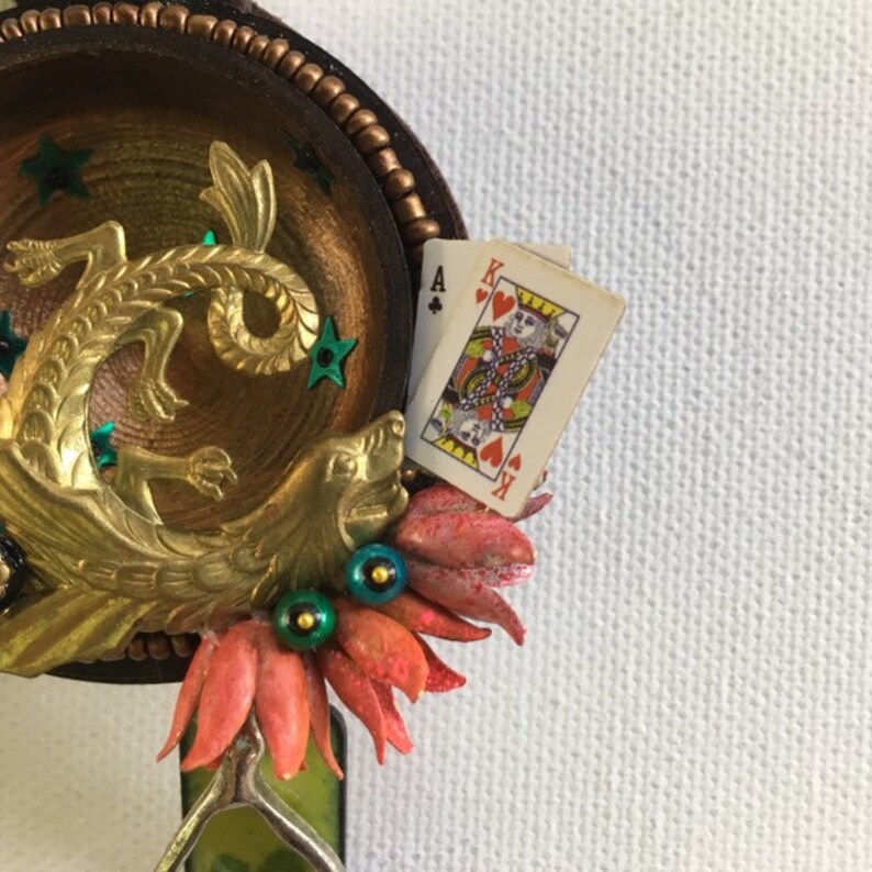 falkor one of a kind and original hanging art ornament. wishbone blackjack love dragon assemblage good luck