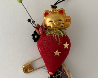 maneki-neko good luck cat and vintage strawberry pincushion assemblage art. folk art ornament. one of a kind and original