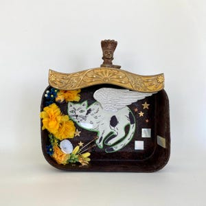 angel cat assemblage art altar art nicho. found object mixed media contemporary folk art. one of a kind and original altered art.