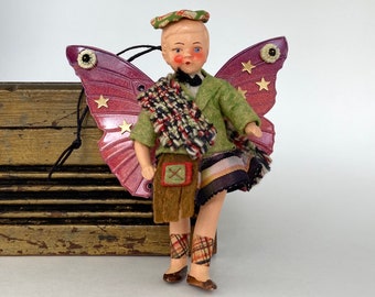 art doll ornament. scottish butterfly assemblage art. one of a kind and original hanging folk art.