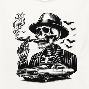 May include: White t-shirt featuring a black and white graphic of a skeleton wearing a fedora and pinstripe suit, smoking a cigar. A classic car is below the skeleton, with bats in the background.