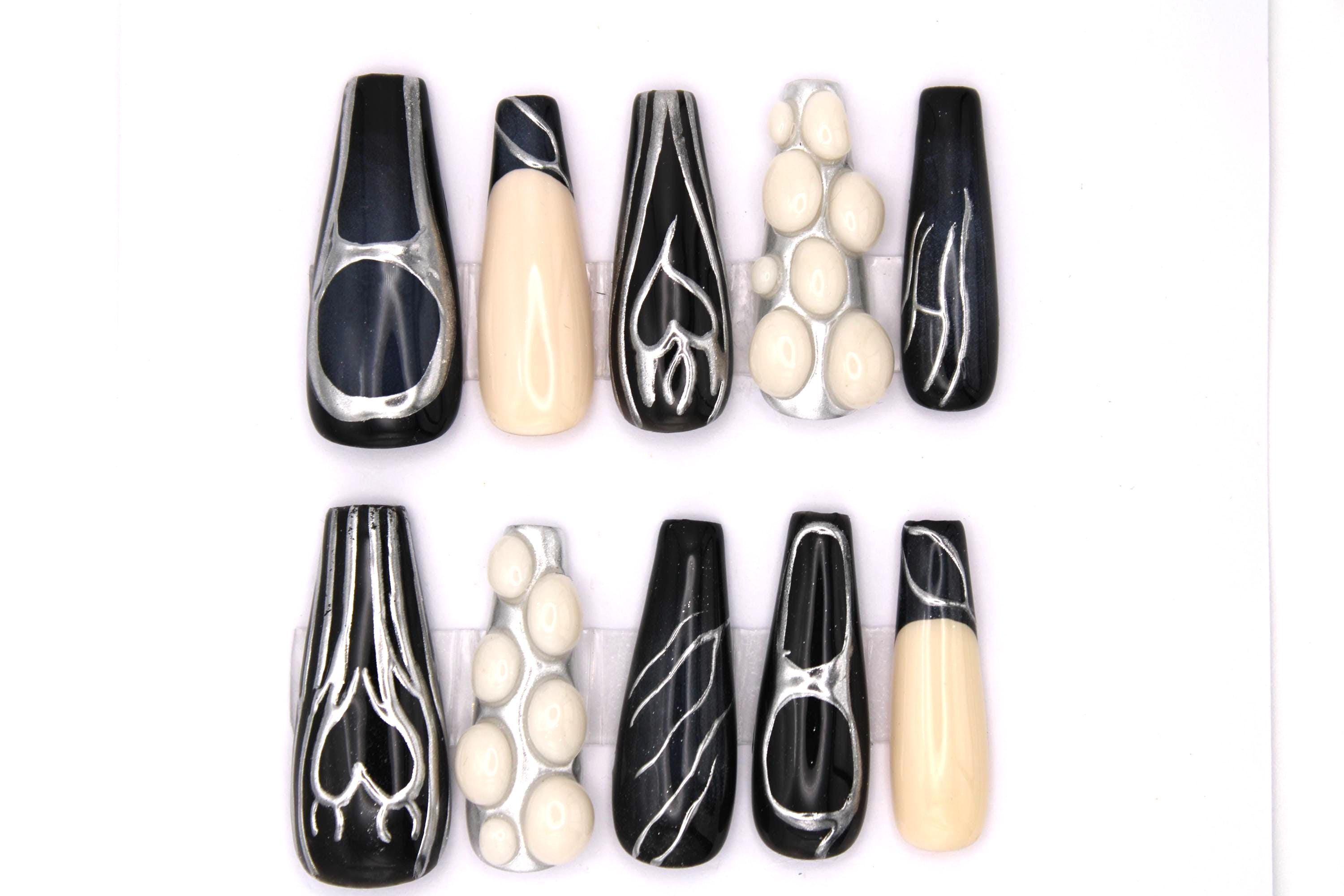 Futuristic Black & Silver Nails