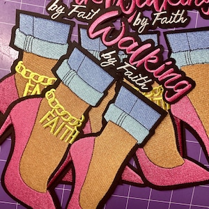 May include: Embroidered patches featuring a tan ankle wearing a pink high heel shoe, blue cuffed jeans, and a yellow chain anklet with the word FAITH. The text Walk by Faith is embroidered in pink and white above the shoe designs on each patch.