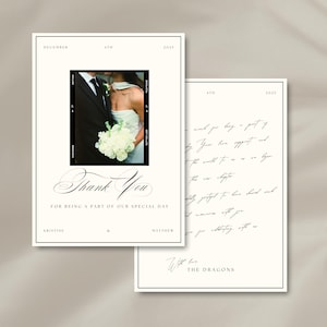 May include: A pair of wedding thank you cards. The front card has a black and white photo of a couple, with the words "Thank You" in elegant script. The date and names are also included. The second card has handwritten text.