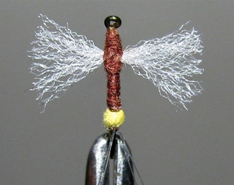 One half dozen Rusty spinners in sizes from 12 to 20, with or without egg sac trout fishing flies
