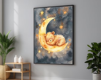 May include: A framed wall art print featuring a watercolor illustration of a light brown bear cub sleeping on a yellow crescent moon. The background is a dark blue, cloudy night sky filled with scattered yellow stars of varying sizes.