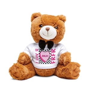 May include: A brown teddy bear with a black bow tie and a white t-shirt. The t-shirt has a pink heart with the word "BRUH" and the phrases "I LUV U" and "FRFR" in pink and black checkered pattern.