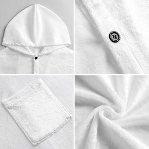 May include: White hooded towel with a button closure and a small pocket. The towel is made of a soft, plush material. The hood is designed to cover the head, and the pocket is located on the front of the towel.