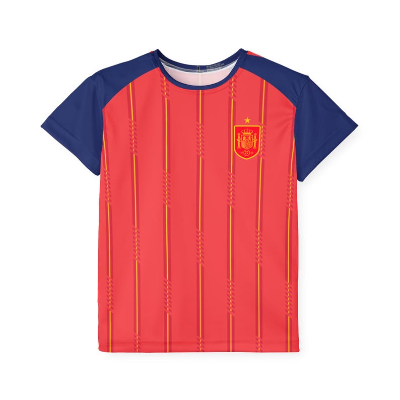 May include: Red and yellow striped t-shirt with navy blue sleeves. The shirt features the Spanish coat of arms on the chest. A star is above the coat of arms. The shirt is a soccer jersey.