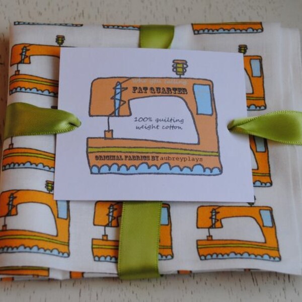 sewing girl in orange.  Original Fabric Fat Quarter