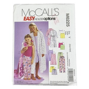 May include: A McCall's M6225 sewing pattern envelope for lounge wear. The front displays illustrations of robes, tank tops, and pajama pants in various colors and floral prints, alongside text including 'EASY ENDLESS options' and size Y.