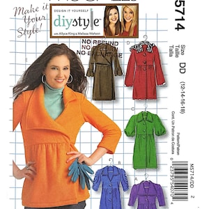May include: McCall's M5714 sewing pattern envelope featuring a grid background and text. It displays illustrations of five different coat styles in orange, olive, red, green, and purple, along with a photograph of a person wearing the orange coat.