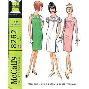 May include: A McCall's 8262 sewing pattern envelope featuring illustrations of three dresses for teens and juniors. The designs include a sleeveless green dress, a white dress with puff sleeves, and a pink dress with long lace sleeves and cuffs.