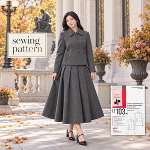 May include: A charcoal gray double-breasted jacket with a collar and brown buttons, paired with a matching pleated midi skirt. The image includes a sewing pattern envelope labeled LE 103, featuring a technical sketch of the pea-coat design.