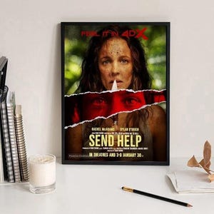 May include: Framed movie poster for "Send Help" featuring Rachel McAdams and Dylan O'Brien. The poster has a torn design revealing a red background. Text includes "Feel it in 4D" and the release date.
