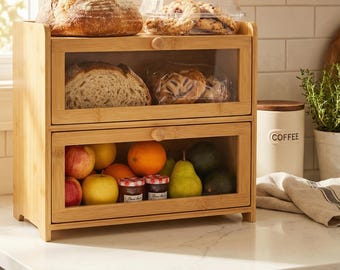 Countertop bread box with clear drawers keeps loaves, bagels, and snacks organized