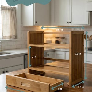 Measurement graphic showing countertop organizer dimensions and removable drawer layout on a kitchen counter.