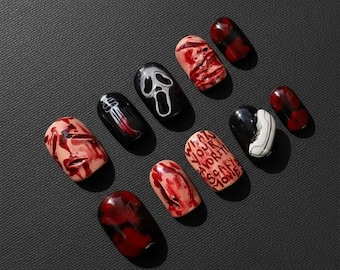 Uñas postizas de película de terror y gritos: Arte de uñas con cara de fantasma sangriento