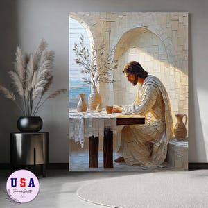May include: A rectangular wall art print depicting a figure with long hair wearing a draped robe, seated at a table with ceramic vessels and a leafy branch in a vase. The scene is set within an arched stone structure with a view of the sea.