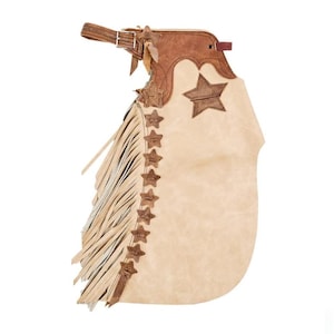 May include: Tan leather chaps with brown leather accents and star-shaped embellishments. The chaps feature a fringe along the side and a buckle closure at the top. A western-style garment.