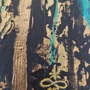 May include: An abstract painting on canvas featuring thick, textured layers of black, metallic gold, and bright turquoise paint. The composition displays vertical brushstrokes and a prominent hand-painted gold symbol at the bottom center.