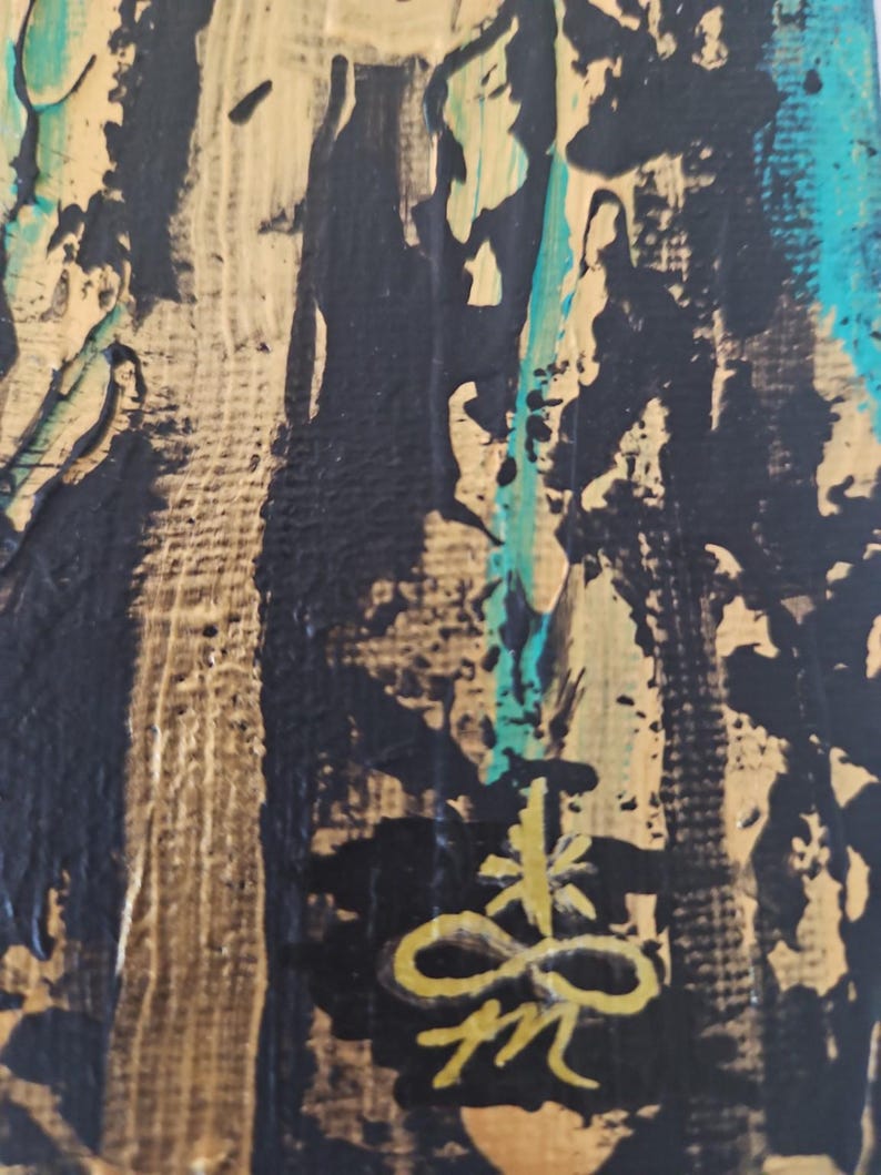 May include: An abstract painting on canvas featuring thick, textured layers of black, metallic gold, and bright turquoise paint. The composition displays vertical brushstrokes and a prominent hand-painted gold symbol at the bottom center.
