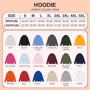 Op de afbeelding: Een kleurentabel met unisex hoodies, in maten van S tot 5XL. De hoodies zijn verkrijgbaar in kleuren als zwart, marineblauw en bordeauxrood. De maattabel toont breedte- en lengtematen in inches, van 50,8 cm tot 86,36 cm.