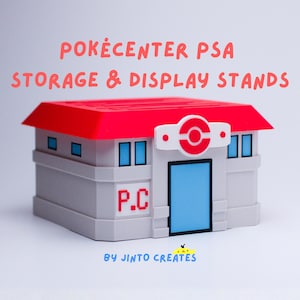 May include: A grey and white Pokecenter PSA storage and display stand with a red roof and blue door. The stand has the letters "P.C." on the side and the text "BY JINTO CREATES" at the bottom.