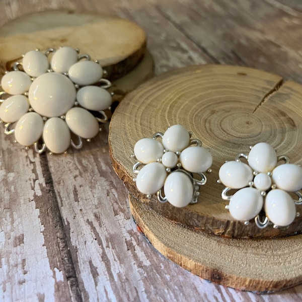 Lisner 3 piece jewelry set with white cabochons and silver tone finish. Clip on earrings and brooch/pin.