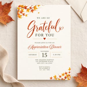 May include: A rectangular invitation card with a cream background featuring orange and yellow autumn leaves in the top left and bottom right corners. The text reads: WE ARE SO Grateful FOR YOU, PLEASE JOIN US FOR AN Appreciation Dinner, SATURDAY NOVEMBER 15 5:30 PM.