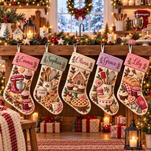 May include: Five cream-colored Christmas stockings hanging in a row, each featuring a unique embroidered name: Emma, Sophia, Olivia, Grace, and Lily. The stockings are decorated with detailed 3D-style appliqués of baking tools and holiday treats.