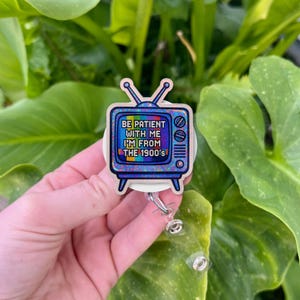 Retro TV Badge Reel: Funny 1900s Humor ID Holder