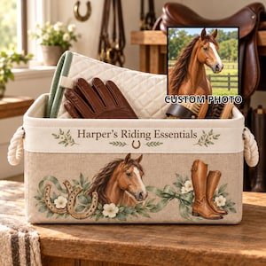 May include: A rectangular fabric storage bin with rope handles, featuring the text "Harper's Riding Essentials," a horse head illustration, two horseshoes, and brown riding boots. A custom photo of a brown horse is displayed above.